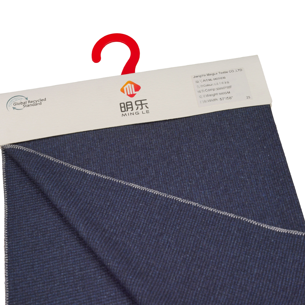 30 % ull, 60 % polyester, 10 % annan fiber, 560G/M, Benzhiqing + blågrön, horisontellt randigt tweedtyg, ML-04231230