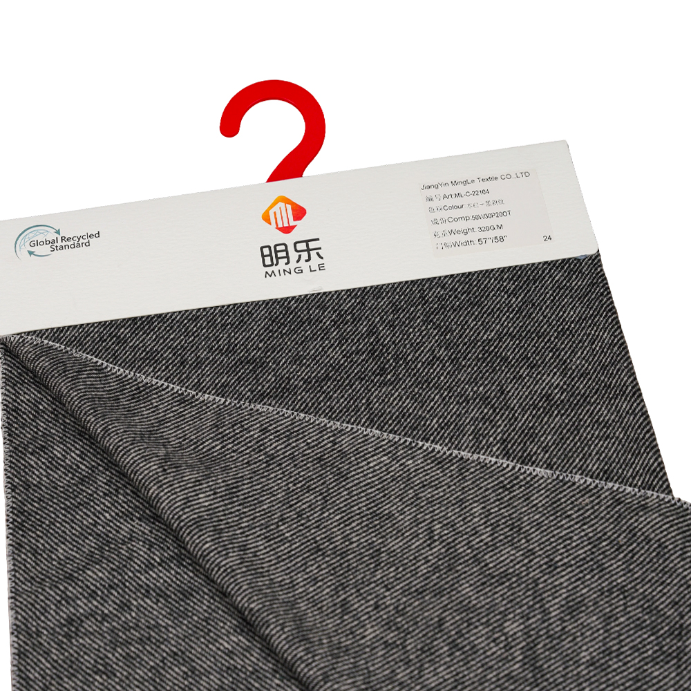 50 % ull, 30 % polyester, 20 % annan fiber, 320G/M, off-white + svart, kypert flanelltyg, ML-C-22104